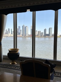 a large window with a view of a city